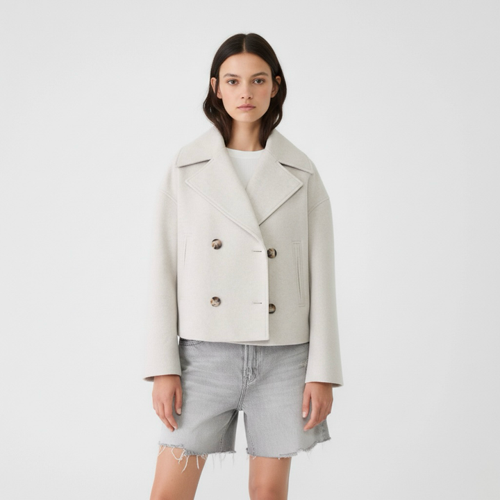 Cappotto lungo da donna con doppia abbottonatura frontale per l'inverno