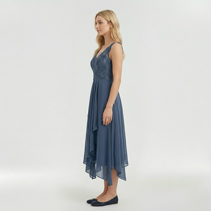 Εlegant βραδινό φόρεμα για γυναίκα με ασύμμετρη φούστα