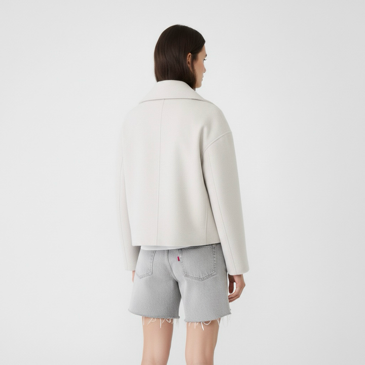 Cappotto lungo da donna con doppia abbottonatura frontale per l'inverno