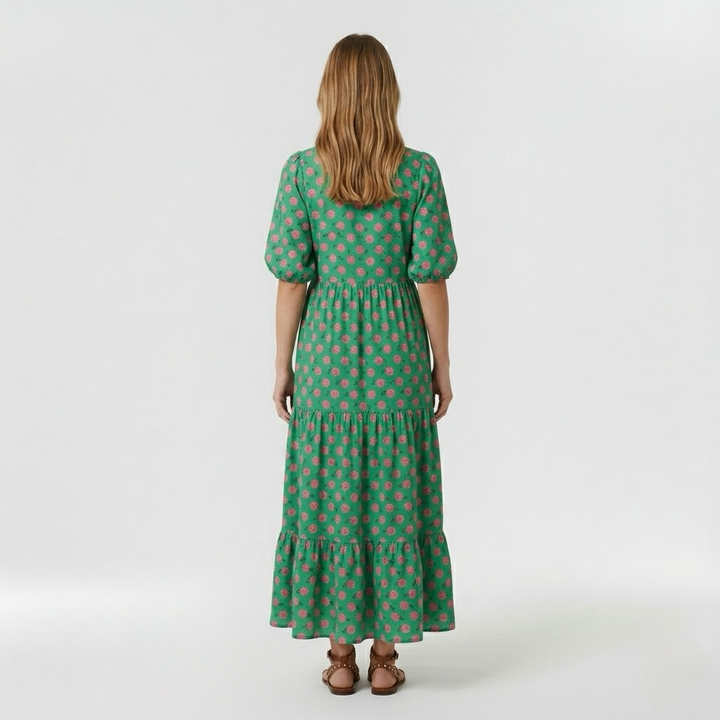 Abito lungo verde a fantasia con maniche corte da donna