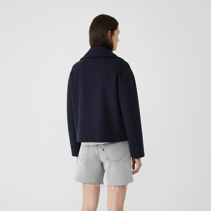 Cappotto lungo da donna con doppia abbottonatura frontale per l'inverno